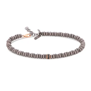 Bracciale uomo con anellini in titanio, rondella in oro rosso 9 kt e diamanti black