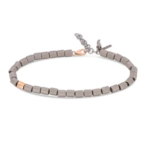 Bracciale uomo con esagonini in titanio, un esagono in oro rosso 9 kt